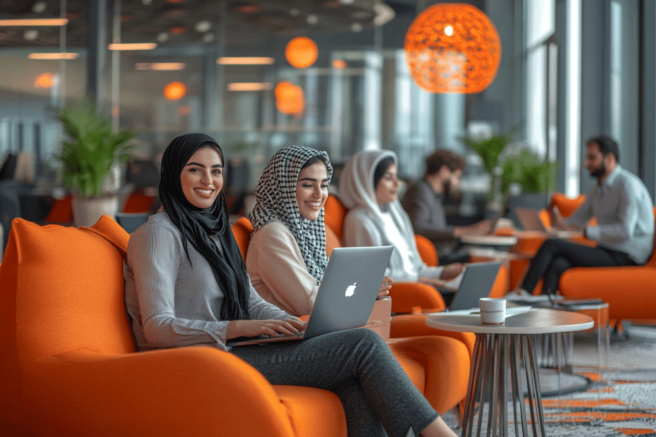 Diverse employees collaborating in a modern office environment in Saudi Arabia, symbolizing strong employee engagement, leadership interaction, and professional growth.